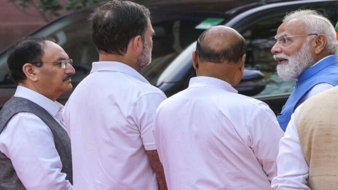 Modi and Rahul Gandhi Share a Rare Moment at Parliament During Phule Jayanti